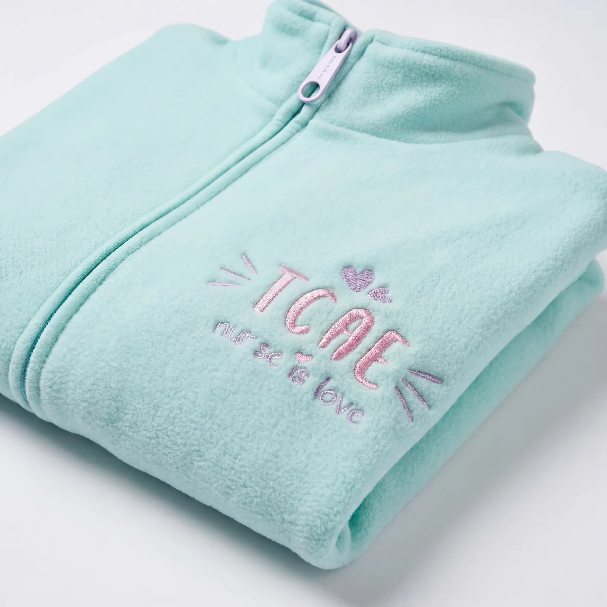 Chaqueta Polar Aqua TCAE de Nurse is Love para enfermería y sanidad