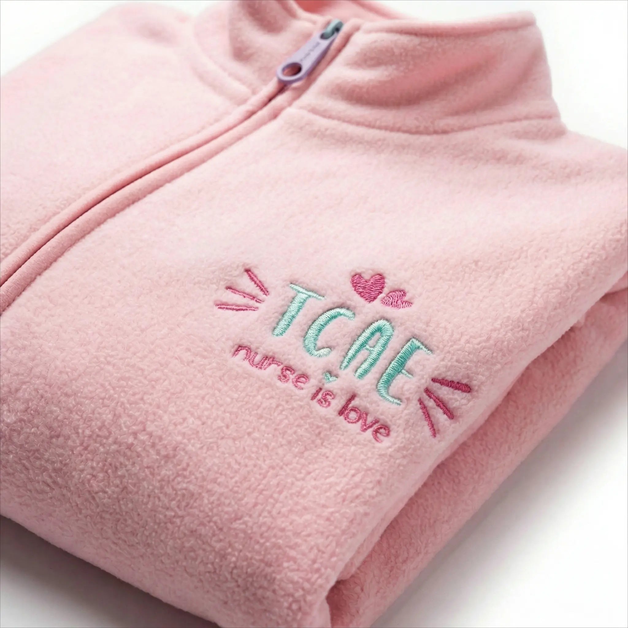 Chaqueta Polar Rosa TCAE de Nurse is Love para enfermería y sanidad